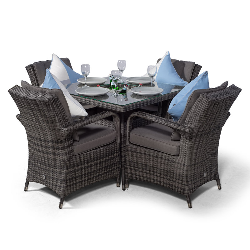 Karas 4 - Person Wicker Patio Dining Set with Square Table , Cushions Included, Grey