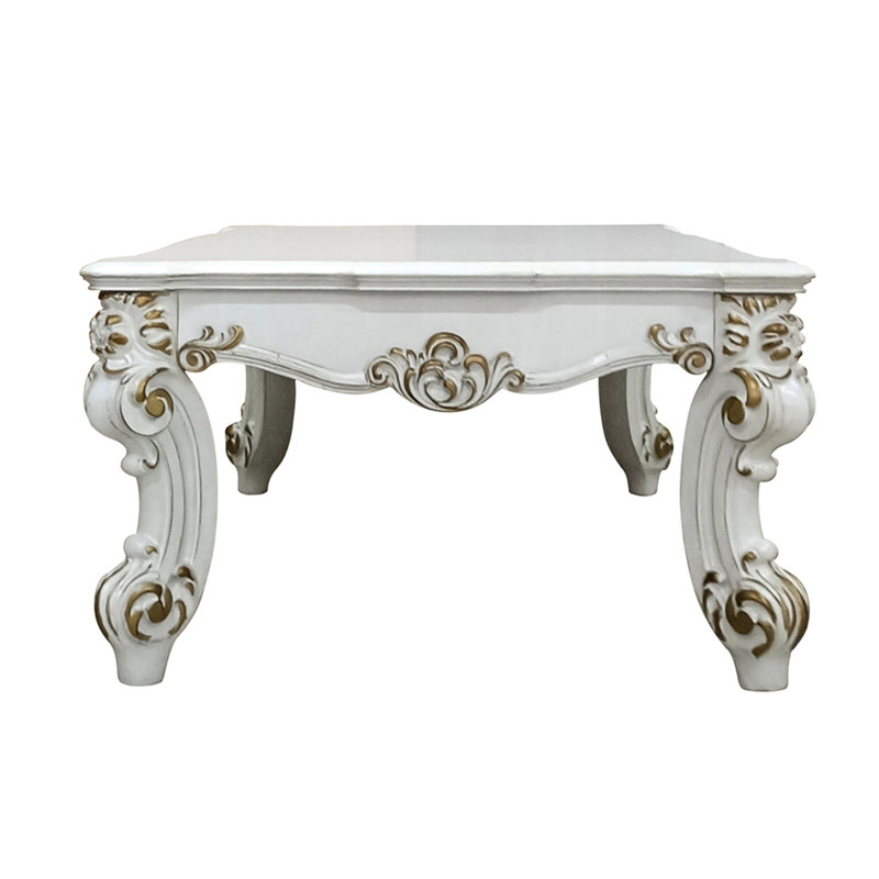 Table basse rectangulaire avec perle antique et décorative - ajoute de la grâce à l'espace classique avec volutes élégantes