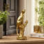 Golden Leopard Figurine On Tree Stump