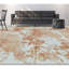 Floral Area Rug in White/Rust