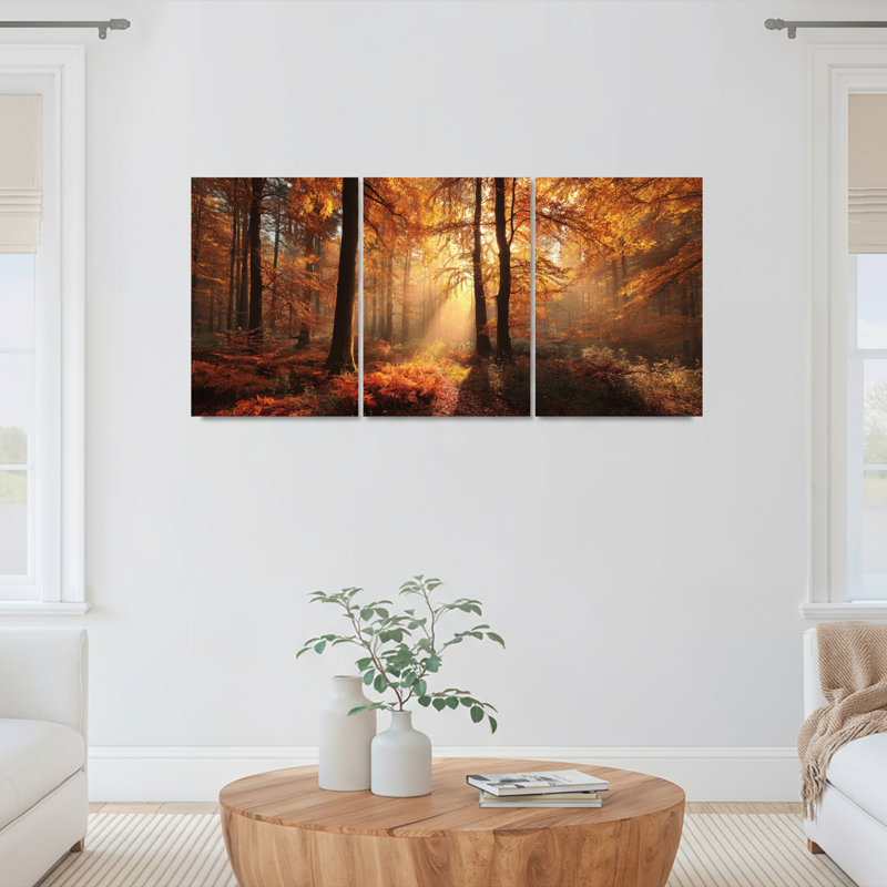 Ensemble de 3 tableaux sur toile tendue représentant une forêt d'automne au soleil, H 30 po x l 60 po