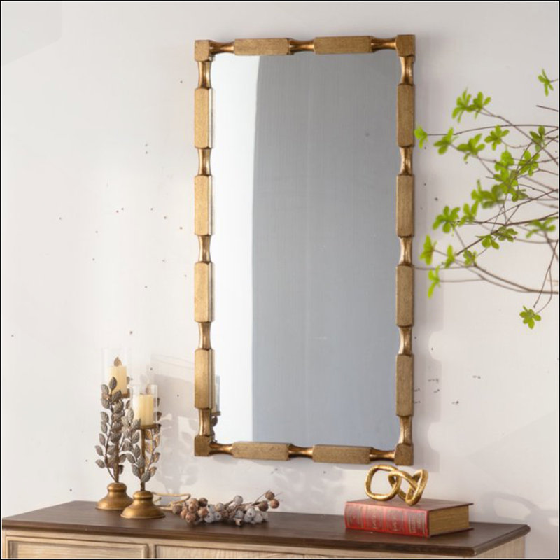 Miroir mural doré