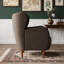 Fauteuil club à oreilles rembourré