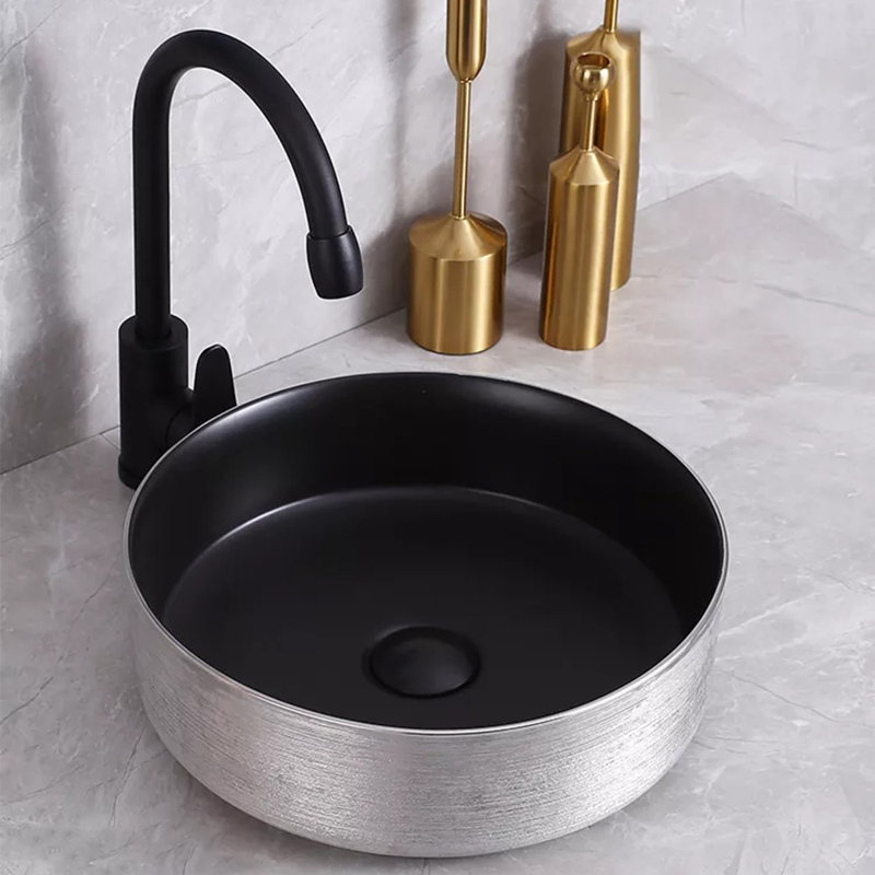 Lavabo rond en porcelaine de 14 po avec finition noire mate et argentée Epona, Noir mat / argent