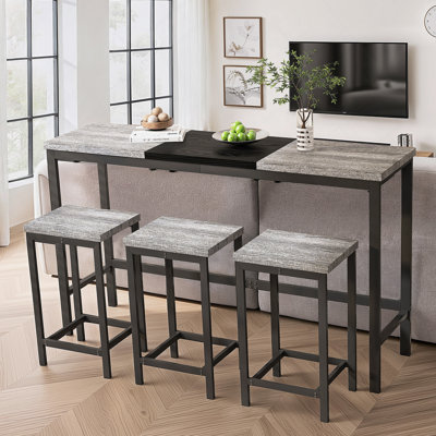 Ensemble de table de salle à manger moderne et fonctionnel avec trois tabourets, idéal pour les petits espaces et la vie sans effort