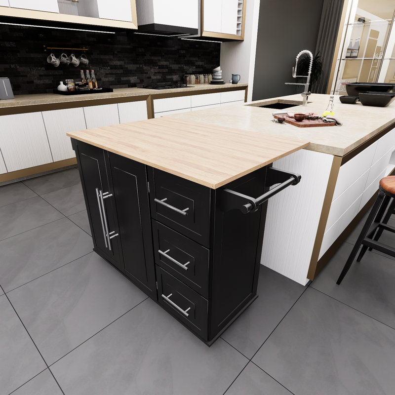 Îlot de cuisine noir avec support à épices, porte-serviettes et plateau de table en bois massif extensible