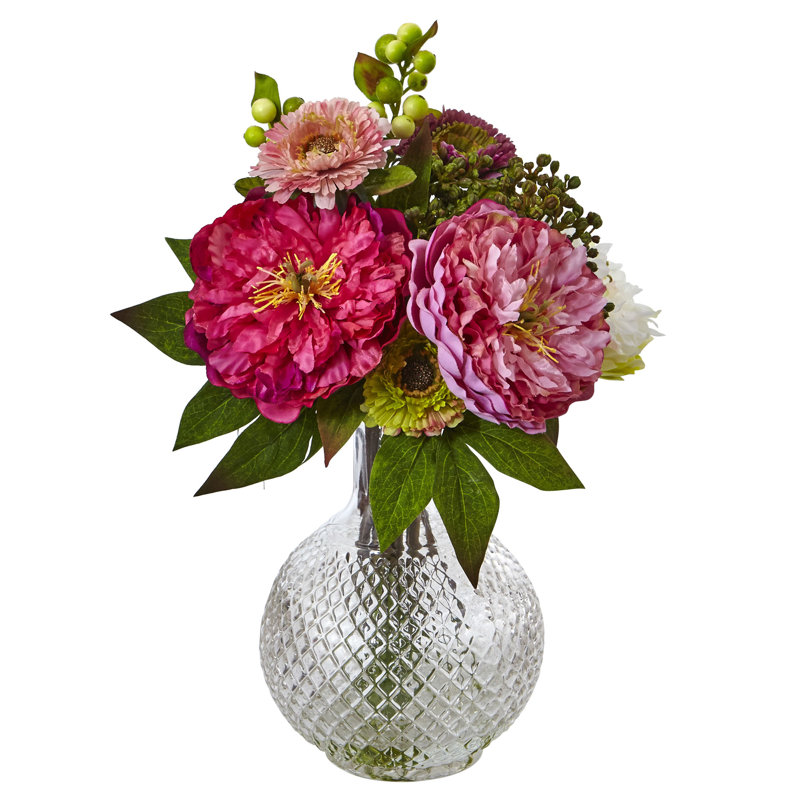 Centre de table à fleurs mélangées dans un vase