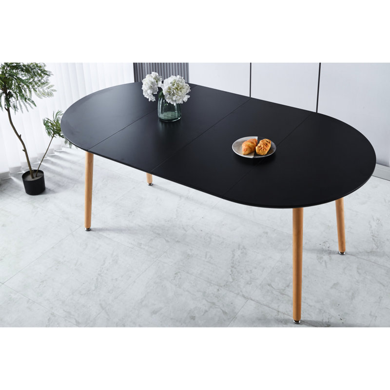 Table basse noire avec design extensible, plateau et pieds en métal, 140 x 100 x 75 cm, détails uniques, idéal pour la salle à manger, design innovant
