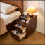 Meuble de rangement Theia en bois avec deux tiroirs et panneau coulissant