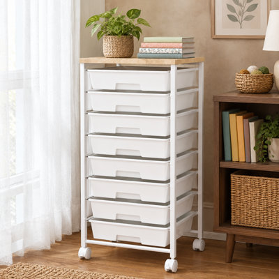 A wooden tabletop and lockable wheels complete this 8-drawer rolling craft storage cart for living rooms, offices, classrooms, craft rooms, and bedrooms