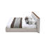 Grand lit gris en tissu