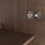 Une armoire de salle de bain brune de 30 pouces avec une porte horizontale à lattes, jumelée à un lavabo en céramique blanche, présente un design moderne à la fois imperméable et durable