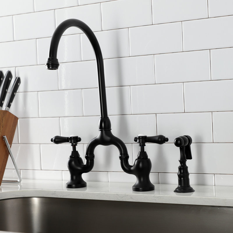 Kingston Brass Heirloom Two-Handle 3-Hole Deck Mount Bridge Kitchen Faucet with Brass Side Sprayer, Matte Black
