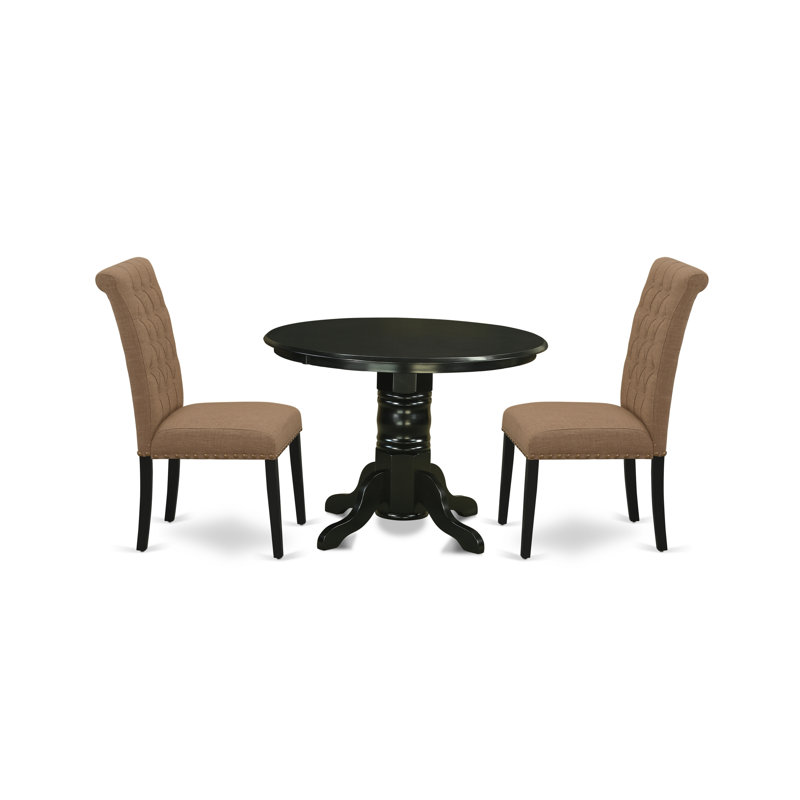 L'ensemble de table de salle à manger 3 pièces comprend une table de salle à manger ronde avec piédestal et 2 chaises rembourrées en tissu de lin sable noir