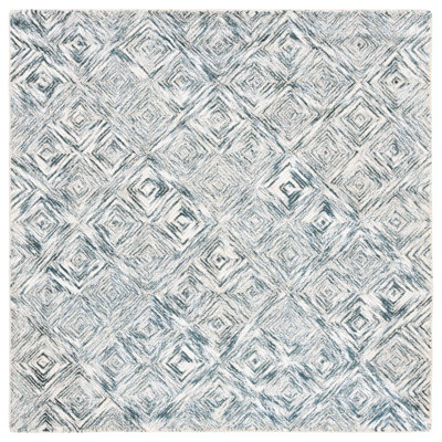 Tapis géométrique vert / ivoire en laine / coton touffeté à la main Christapher