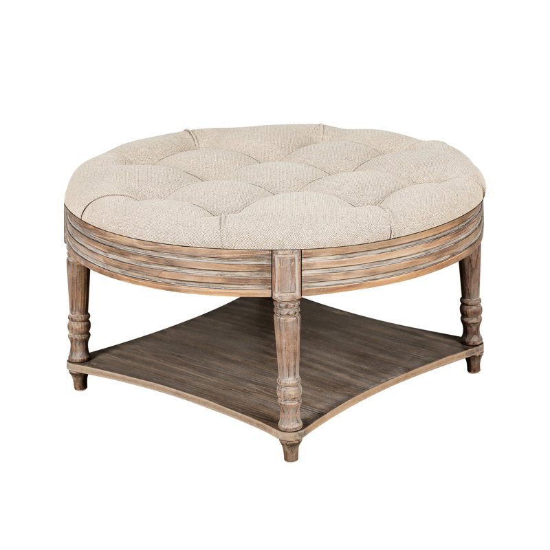 Grande table basse ronde avec rangement en bois et revêtement en lin pour espace de rangement à 2 niveaux avec coussin