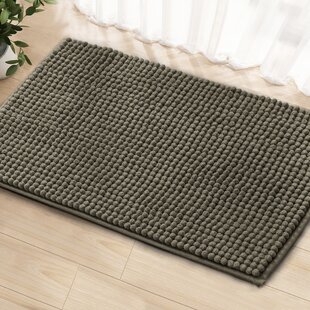 https://assets.wfcdn.com/im/24080036/resize-h310-w310%5Ecompr-r85/1550/155019082/bohumil-bath-rug-with-non-slip-backing.jpg