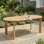Table de salle à manger d'extérieur moderne en bois d'acacia avec plateau lisse et pieds robustes Modern Coastal