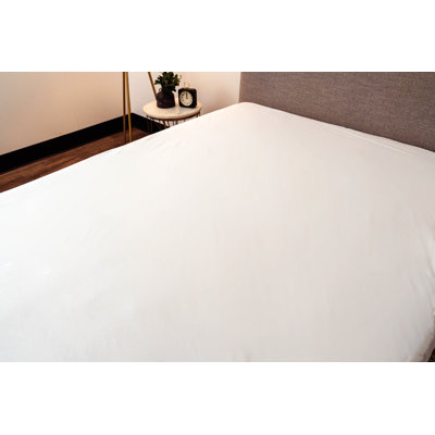 Housse de protection pour matelas en polyester enveloppé et hypoallergénique