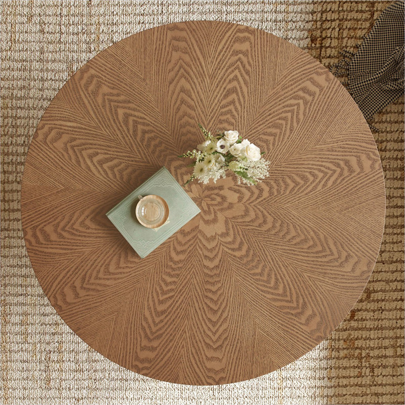 Table basse ronde brune de 31,5 pouces de largeur avec une surface compacte pour les petits salons