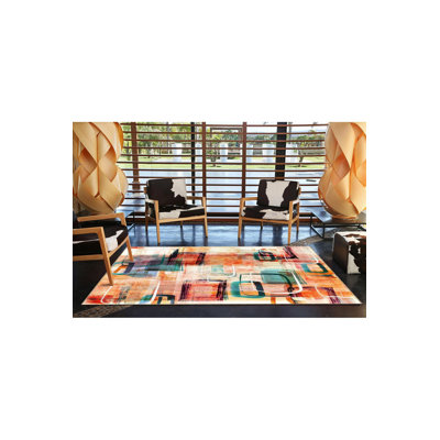 Tapis orange lavable à motif géométrique orange pastel