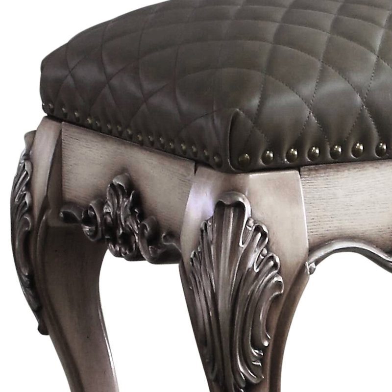 Tabouret de coiffeuse élégant en gris et blanc os rétro pour une chambre à coucher sereine et luxueuse