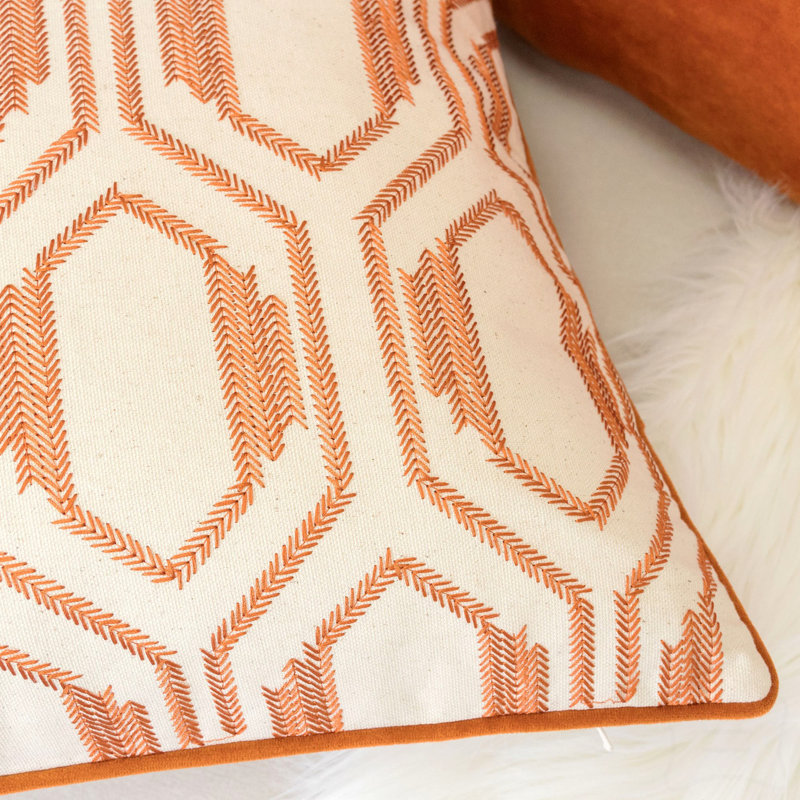 Coussin décoratif géométrique en coton brodé