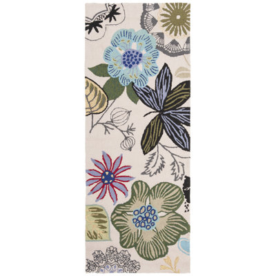 Tapis touffeté à la main à motif floral beige / vert Doyle