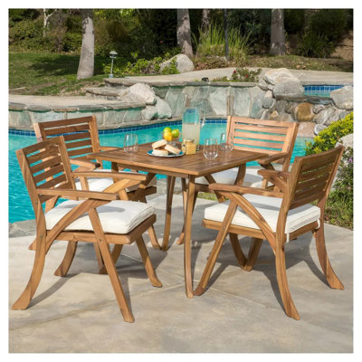 Ensemble repas d'extérieur en bois avec coussins 5 pièces Hermosa