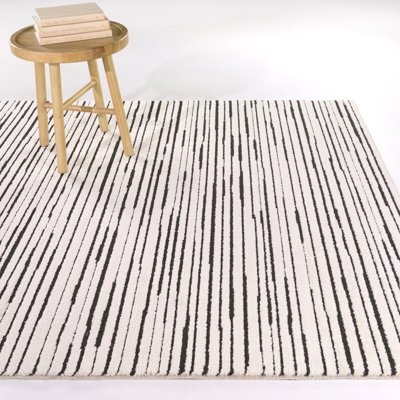 Holzer Cream/Black Abstract Stripe Area Rug