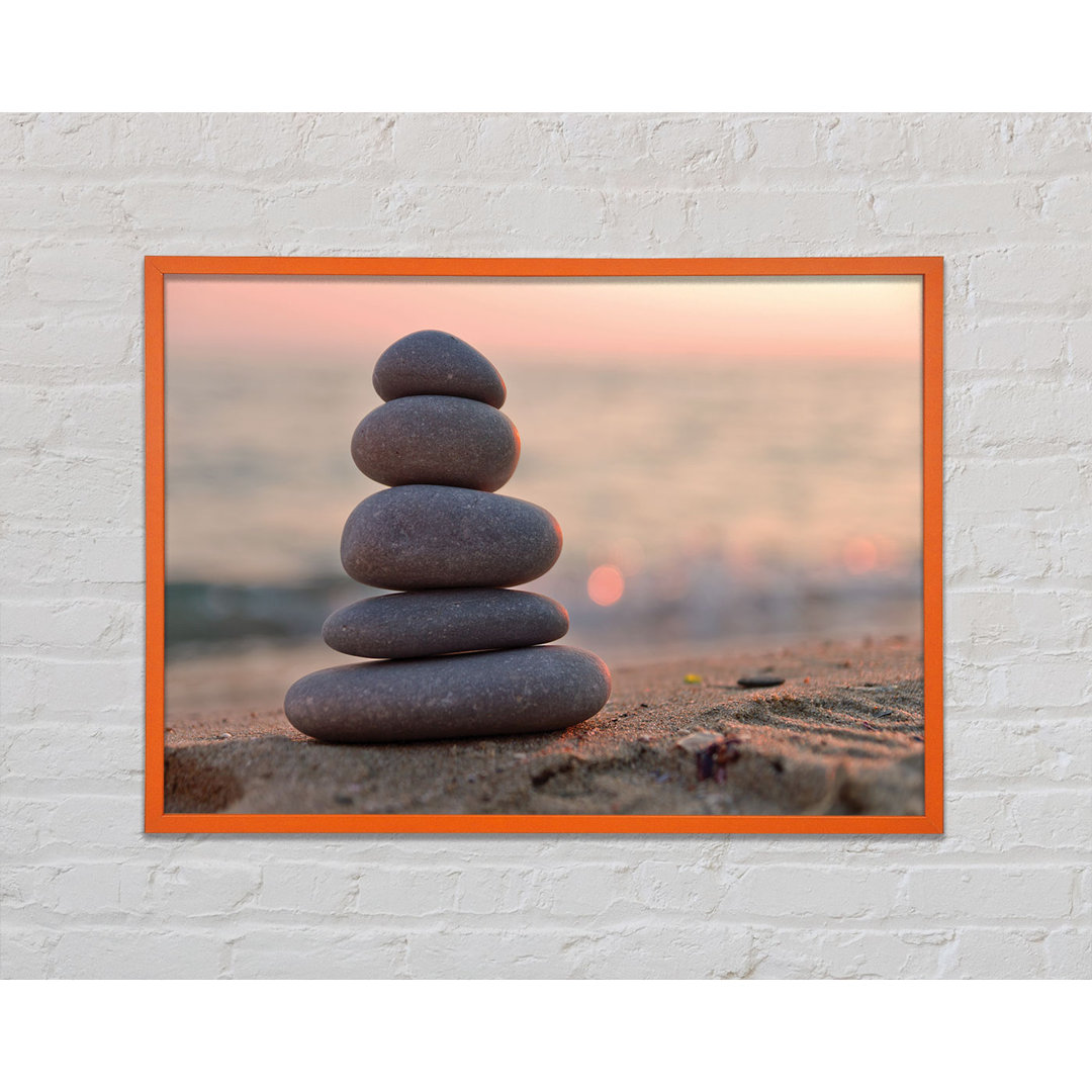 Gerahmter Fotodruck Zen Stones Stacked Up On Beach