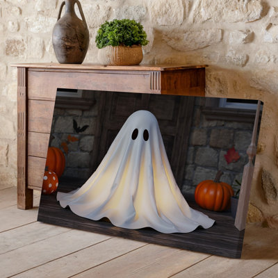 Toile, une scène d'Halloween fantaisiste mettant en vedette un fantôme fabriqué à partir d'un art mural, feuille blanche coulante doucement illuminée de l'intérieur, créant une toile