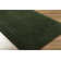 Tapis vert touffeté à la main