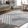 Risette Geometric Shag Tassel Area Rug