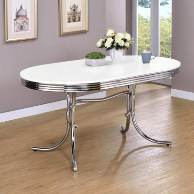 Table de salle à manger ovale blanche et - Ajoute une touche de luxe contemporain avec garniture élégante