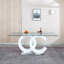 Table de salle à manger en verre trempé avec support central en panneau de fibres à densité moyenne blanc et base en acier inoxydable pour un design moderne-531888840