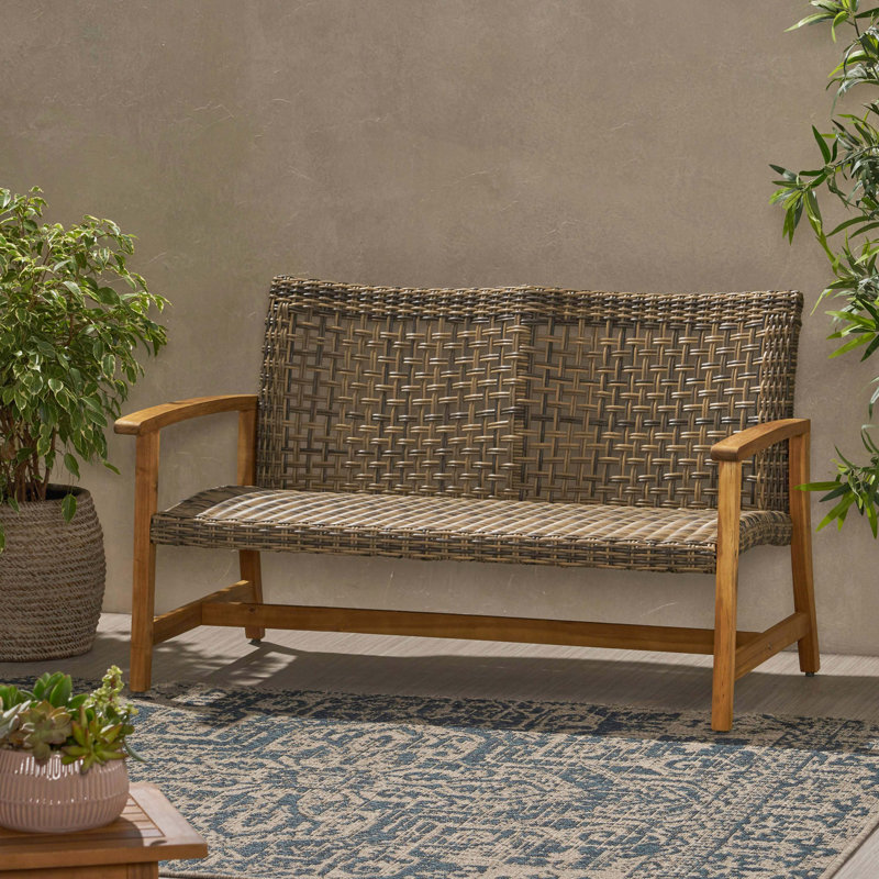 Causeuse d'extérieur en osier avec coussin