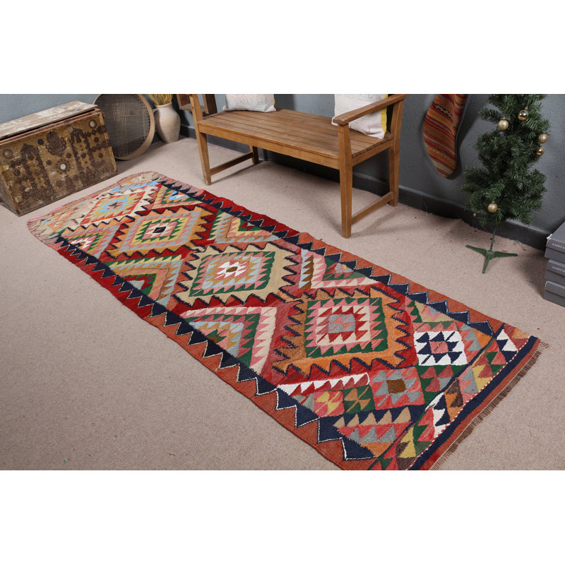 Chemin de table kilim turc tissé à la main dans un design rétro avec des motifs géométriques pour le salon
