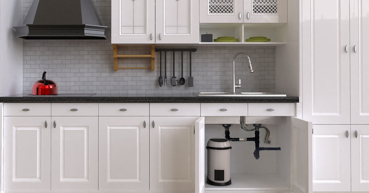 Open kitchen sink cabinets show no hose attached to the pull-down kitchen faucet