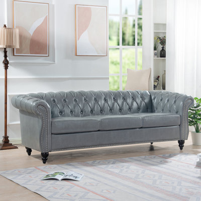 Stylish Rolled Arm Chesterfield 3 Seater Sofa With Soft PU Leather And Easy-Clean Birch Legs, Perfect For Modern Living Rooms