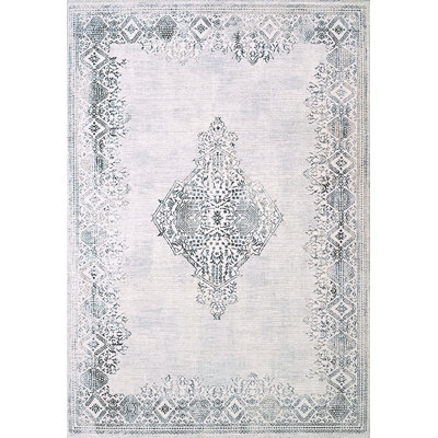Tapis oriental ivoire / bleu
