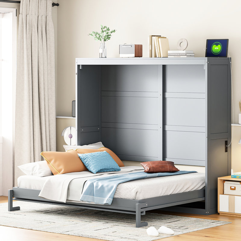 Lit double gris, peu encombrant et facile à utiliser dans un bureau à domicile