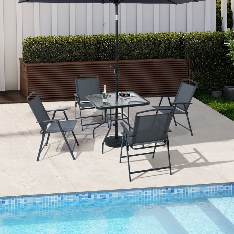 Spirit 4 - Person Patio Dining Set with Unbrella Hole and Folded Chairs, Gray