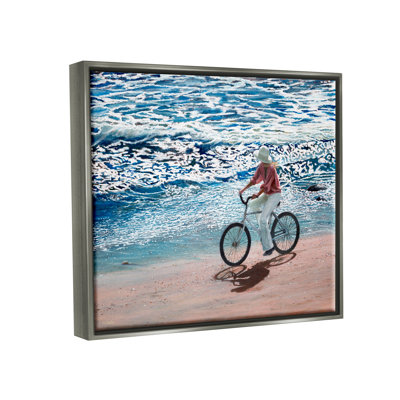 Femme faisant du vélo sur la plage côtière par Tom Mielko - peinture sur toile flottante