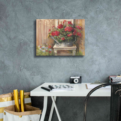 «Aanyla Geraniums On Chair on Canvas» par Carol Rowan, reproduction