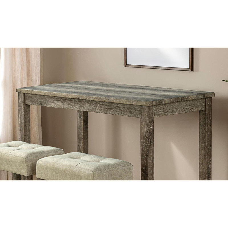 Ensemble de salle à manger moderne 3 pièces avec tabourets capitonnés et table compacte à hauteur de comptoir pour petits espaces.