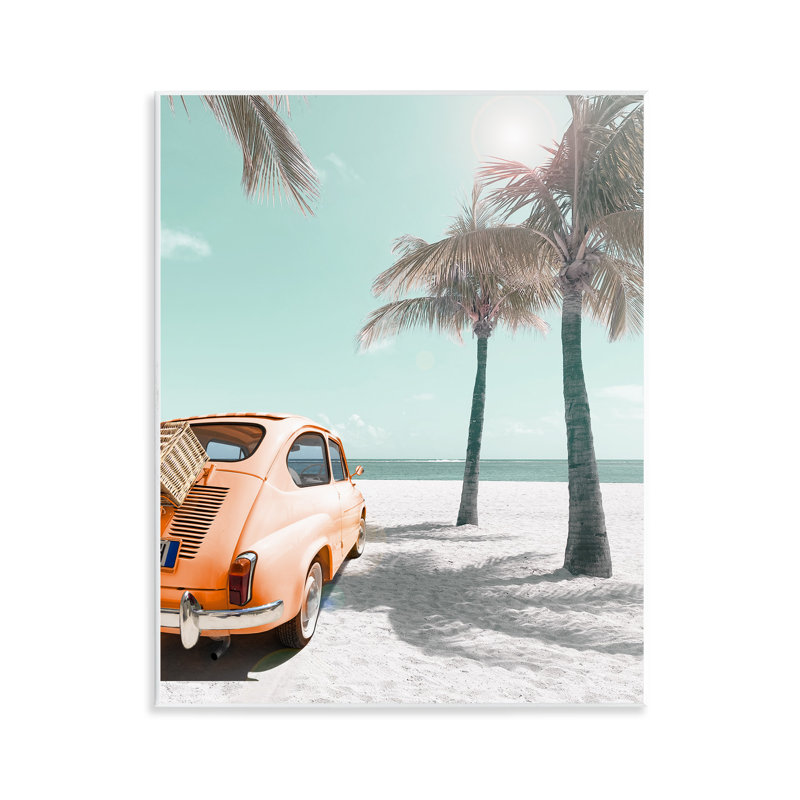 Art mural orange sur une plage par Noah Bay