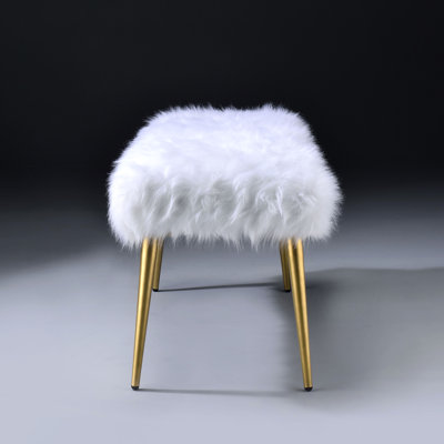 Sleek Bedroom Bench With White Faux Fur Cushion And Golden Metal Legs Gold For