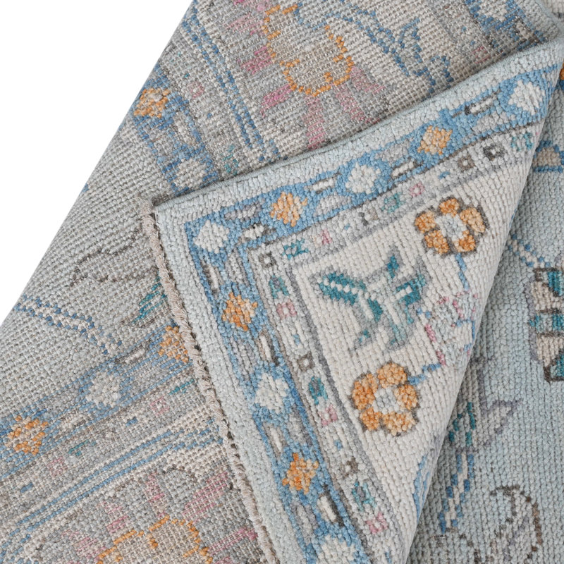 Tapis bleu et ivoire de haute qualité noué à la main