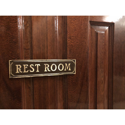 Plaque de porte de toilettes
